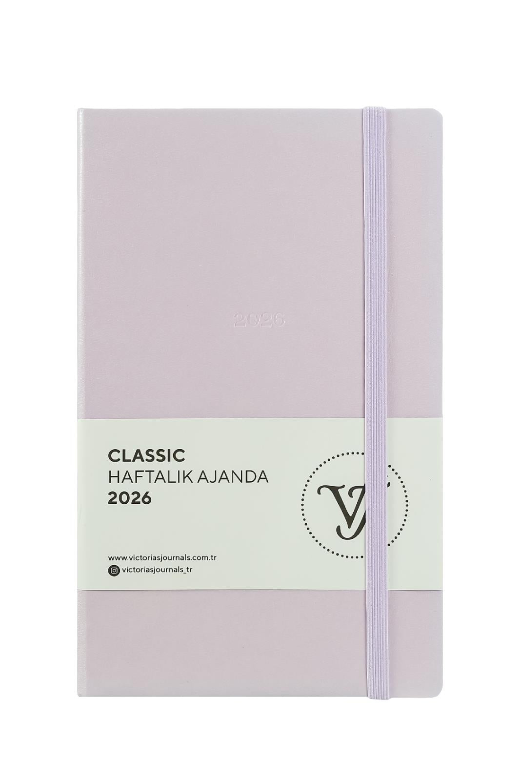 Victoria's Journals Classic 2026 Haftalık Ajanda 13x21 cm.Sert Kapak. Ivory 80 gr.144 Sayfa. Cepli. Lastikli.Lila
